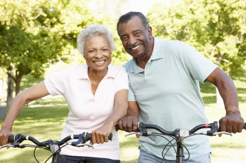 Minority couple on bikes.jpg
